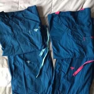 2 pair med couture scrubs